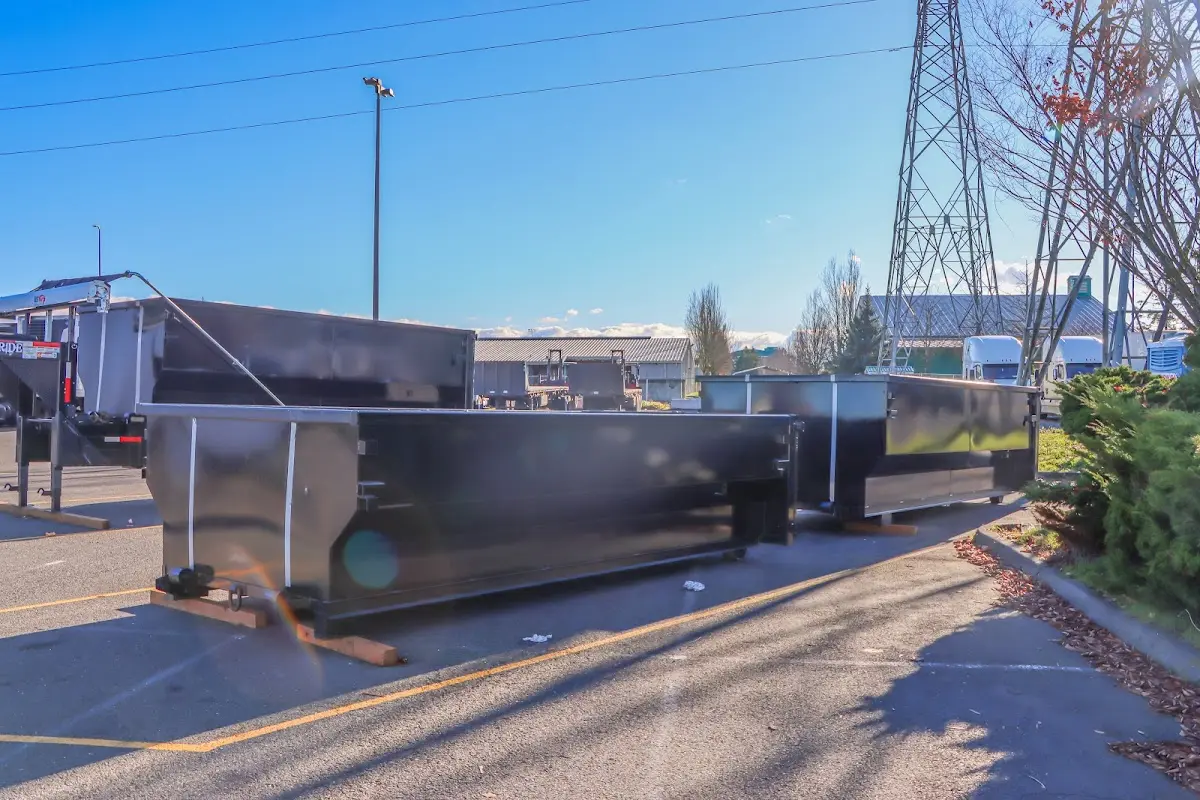 Roll-off dumpster ready for waste disposal at job site for 2 Yard Dumpster Rental in Lynchburg